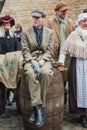 Boy sitting on a barrel during the Dickens Festival in Deventer